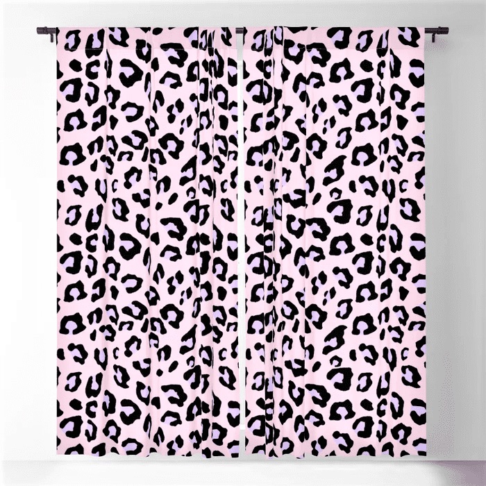 Pink curtains with a black and dark brown leopard print pattern, shown hanging straight down in a well-lit space.